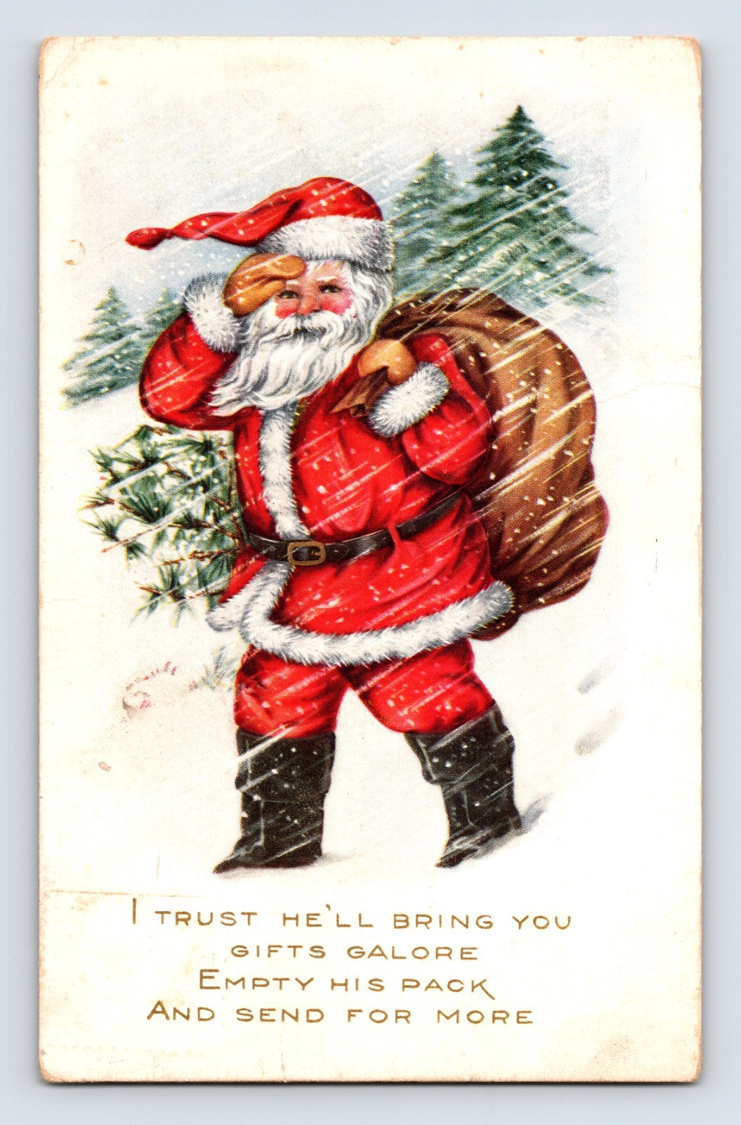 Santa Claus shielding his eyes in a snowstorm while carrying a sack of toys through a winter landscape on this 1916 Christmas postcard with verse greeting.