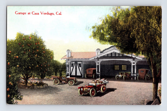 Garage building at Casa Verdugo Spanish restaurant with early automobiles Glendale California 1920s postcard unposted