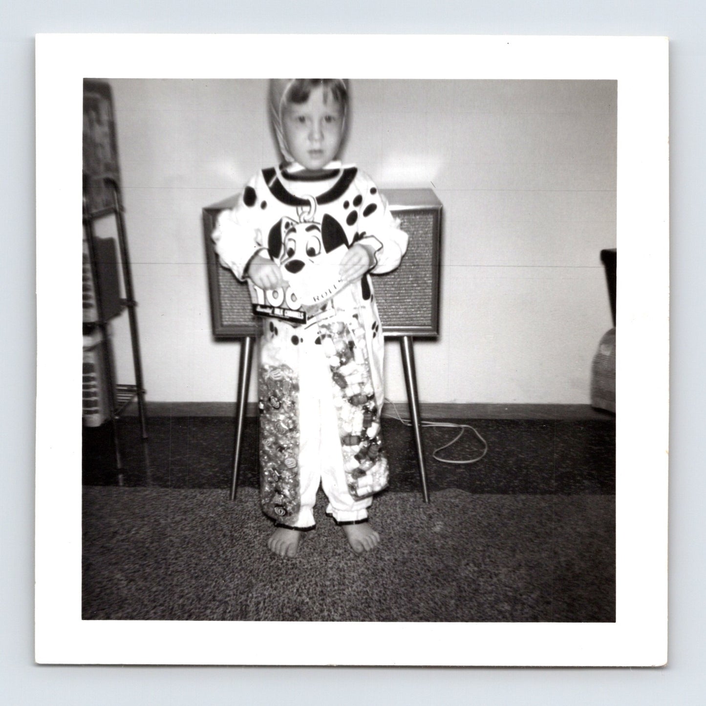 Child Dalmatian dog costume Halloween candy pajamas television living room snapshot mid century