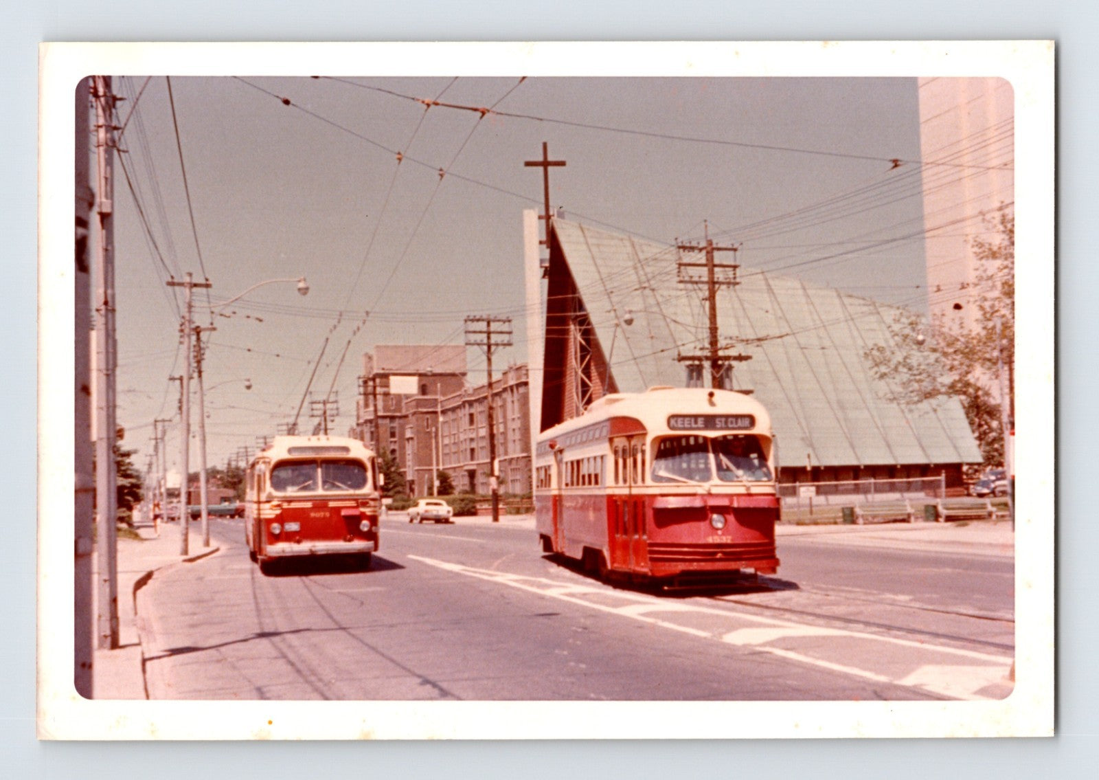 Toronto Transit Commission PCC streetcar and CCF Brill bus on Route 61 Nortown Mt Pleasant Road July 1971