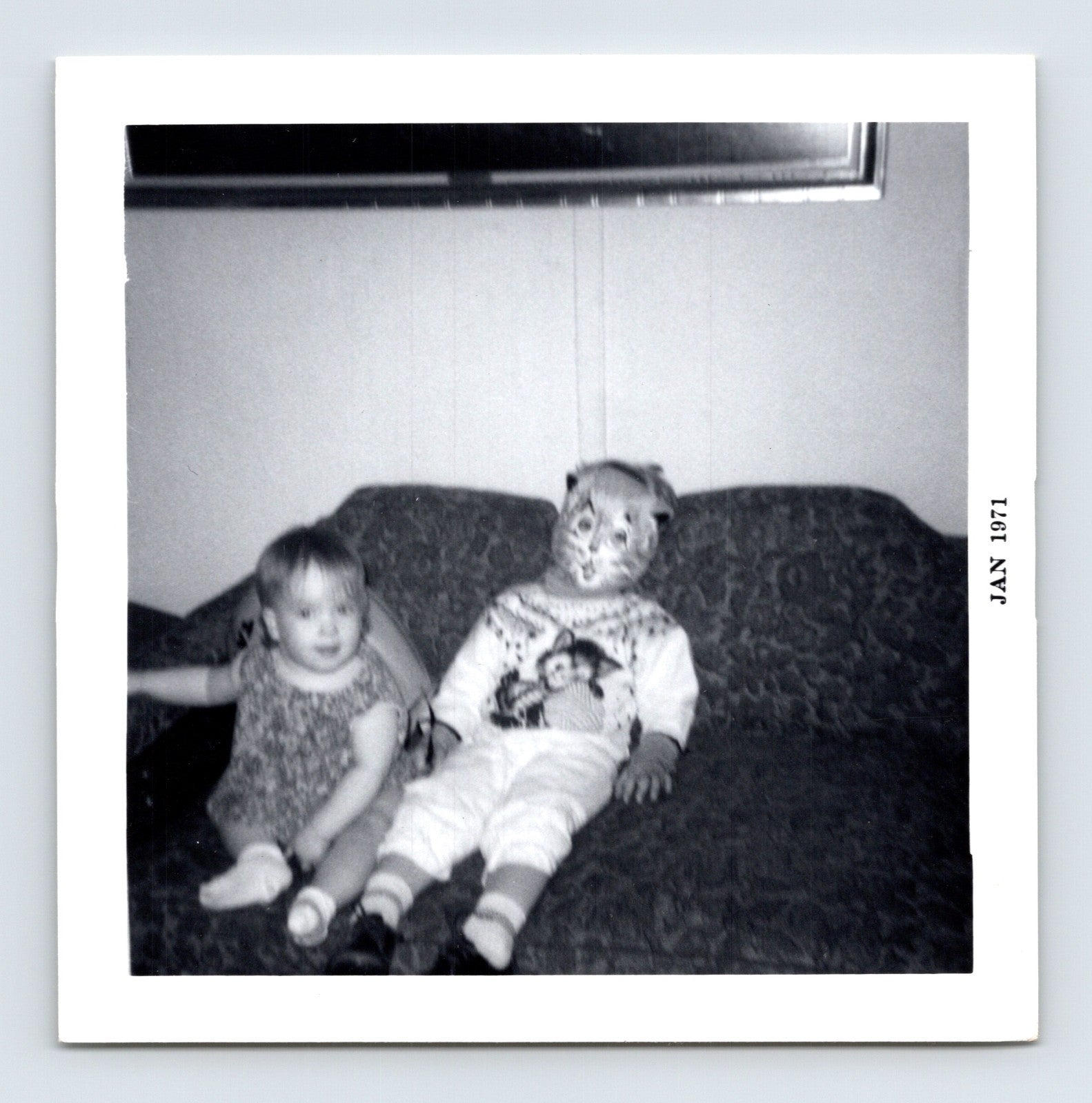 Halloween toddler child mask couch snapshot 1971 baby costume living room vintage photo