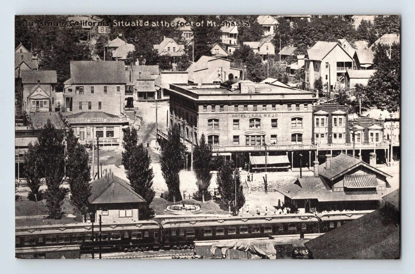 Dunsmuir California railroad depot passenger train downtown view Mount Shasta foothills postcard