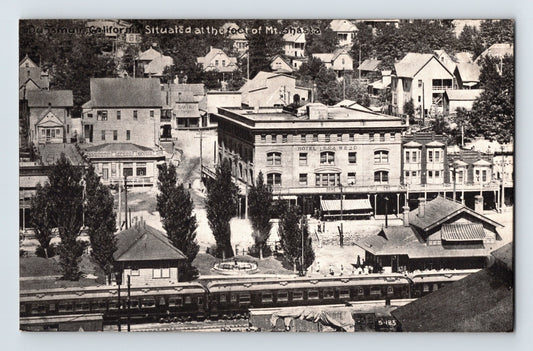 Dunsmuir California railroad depot passenger train downtown view Mount Shasta foothills postcard