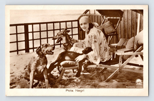 Pola Negri beach portrait with two dogs 1930s Paramount Ross photo postcard