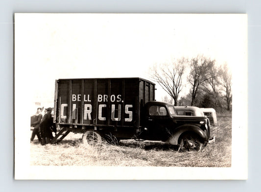 Bell Brothers Circus 1946 truck advertising box truck rural field crew men loading wagon black and white photo