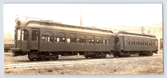 Sepia photograph showing two Western Electric interurban passenger cars on tracks in Philadelphia Pennsylvania circa 1910s