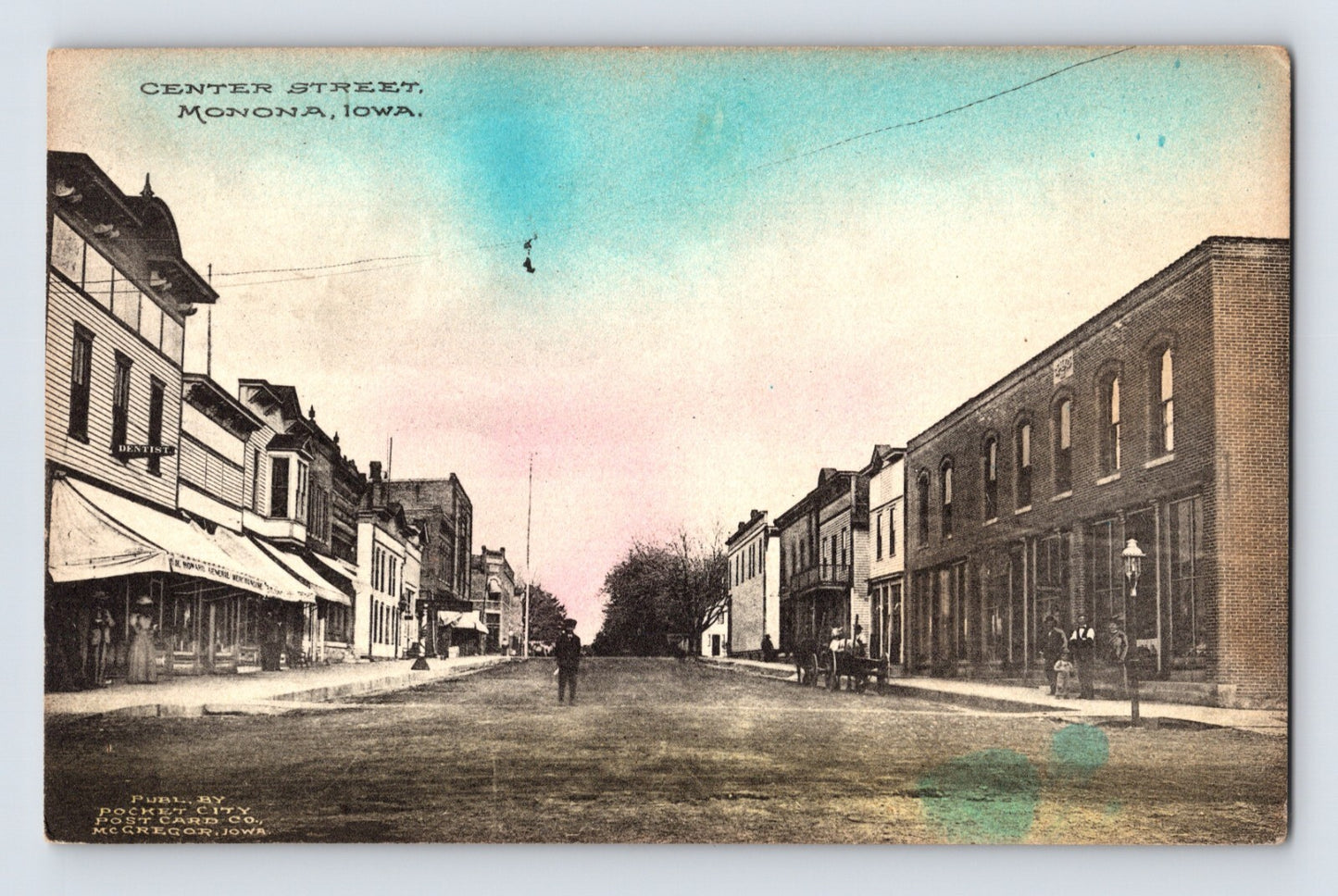 Center Street downtown Monona Iowa early automobile storefronts divided back postcard
