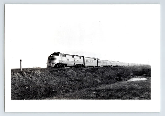 Burlington Route Zephyr streamlined passenger train in open landscape Colorado 1948 railroad photograph