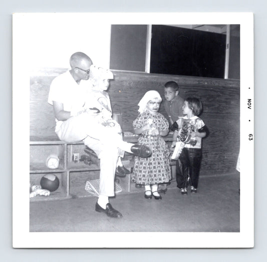 1963 Halloween classroom children costumes seated adult supervising vintage snapshot indoor party photo