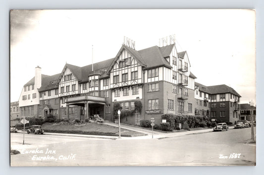 Eureka California Inn hotel Tudor style building street view cars 1940s RPPC postcard Zan 1587