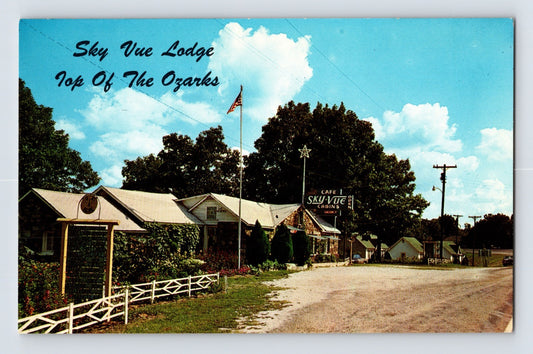 Winslow Arkansas Sky Vue Lodge motel 1960s postcard showing roadside cabins cafe sign and Ozarks landscape
