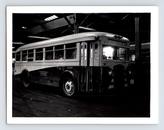 1940s Southern Pennsylvania bus ACF coach number 236 interior garage photograph showing transit vehicle with rounded body and large windows