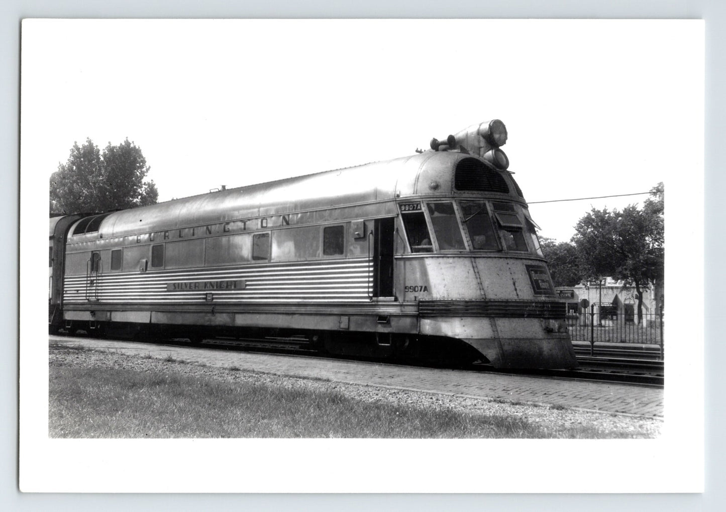 Burlington Route Silver Knight streamlined train locomotive at Downer Grove Illinois 1951 black and white photo