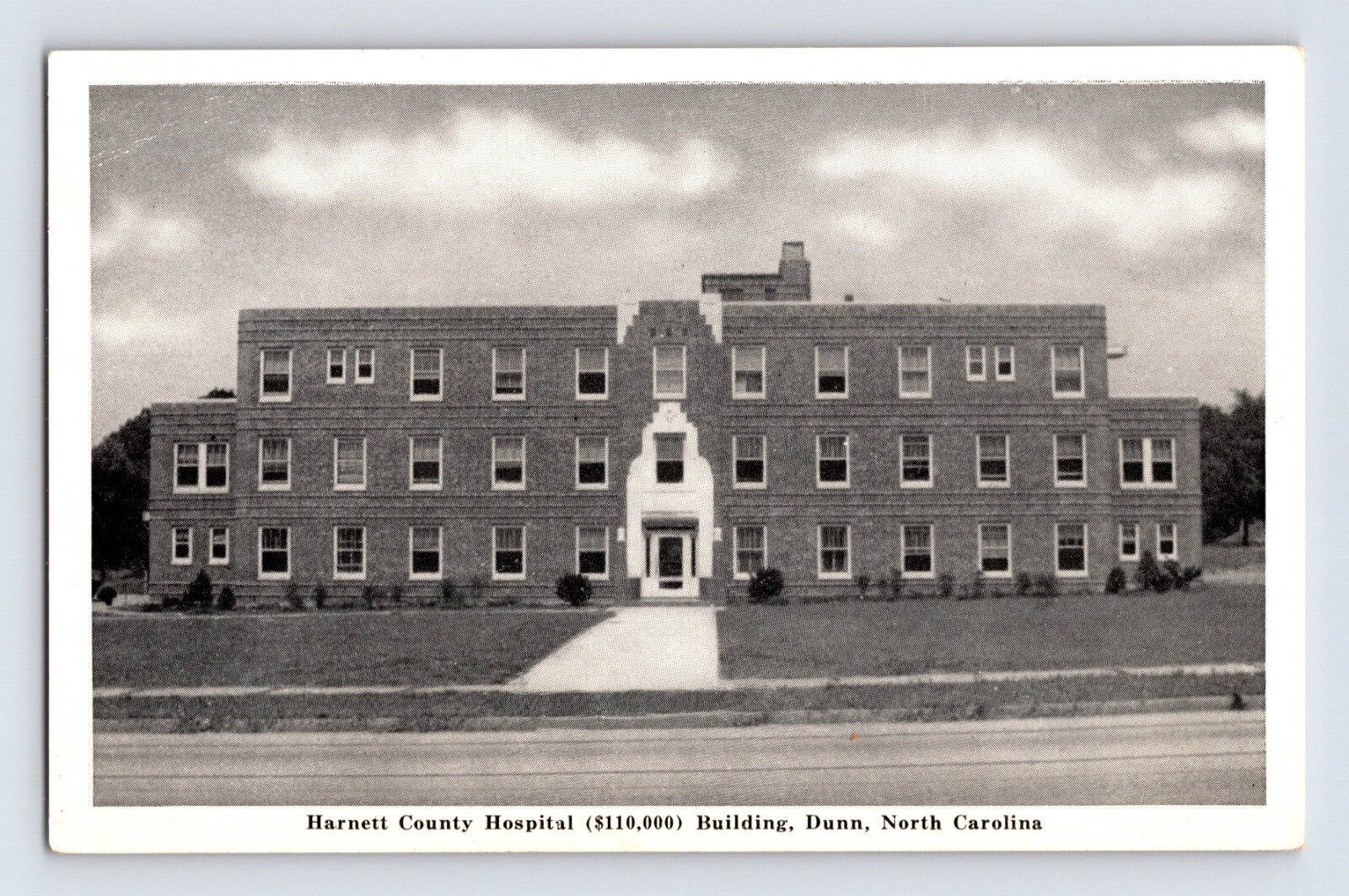 Dunn North Carolina Harnett County hospital 1940s postcard with brick building and central entrance
