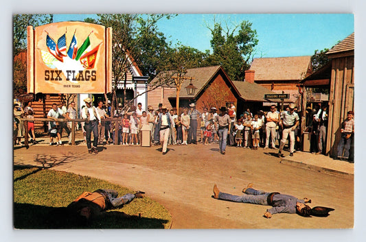 Six Flags Over Texas Dallas Fort Worth outlaw gunfight reenactment crowd western street 1960s postcard