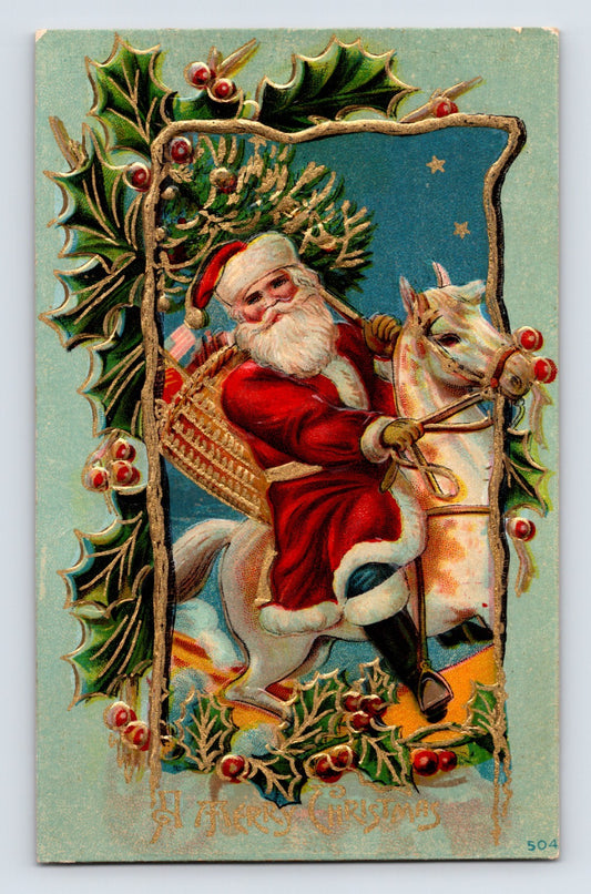 Santa Claus riding a white horse with toy basket and holly frame on this embossed 1911 Christmas postcard.