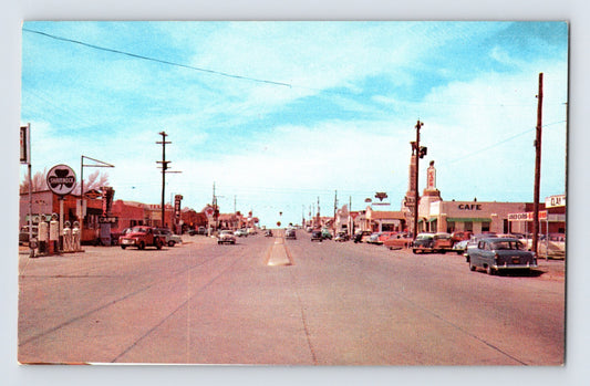 Shamrock Texas Route 66 downtown street gas pumps trucks 1950s chrome postcard