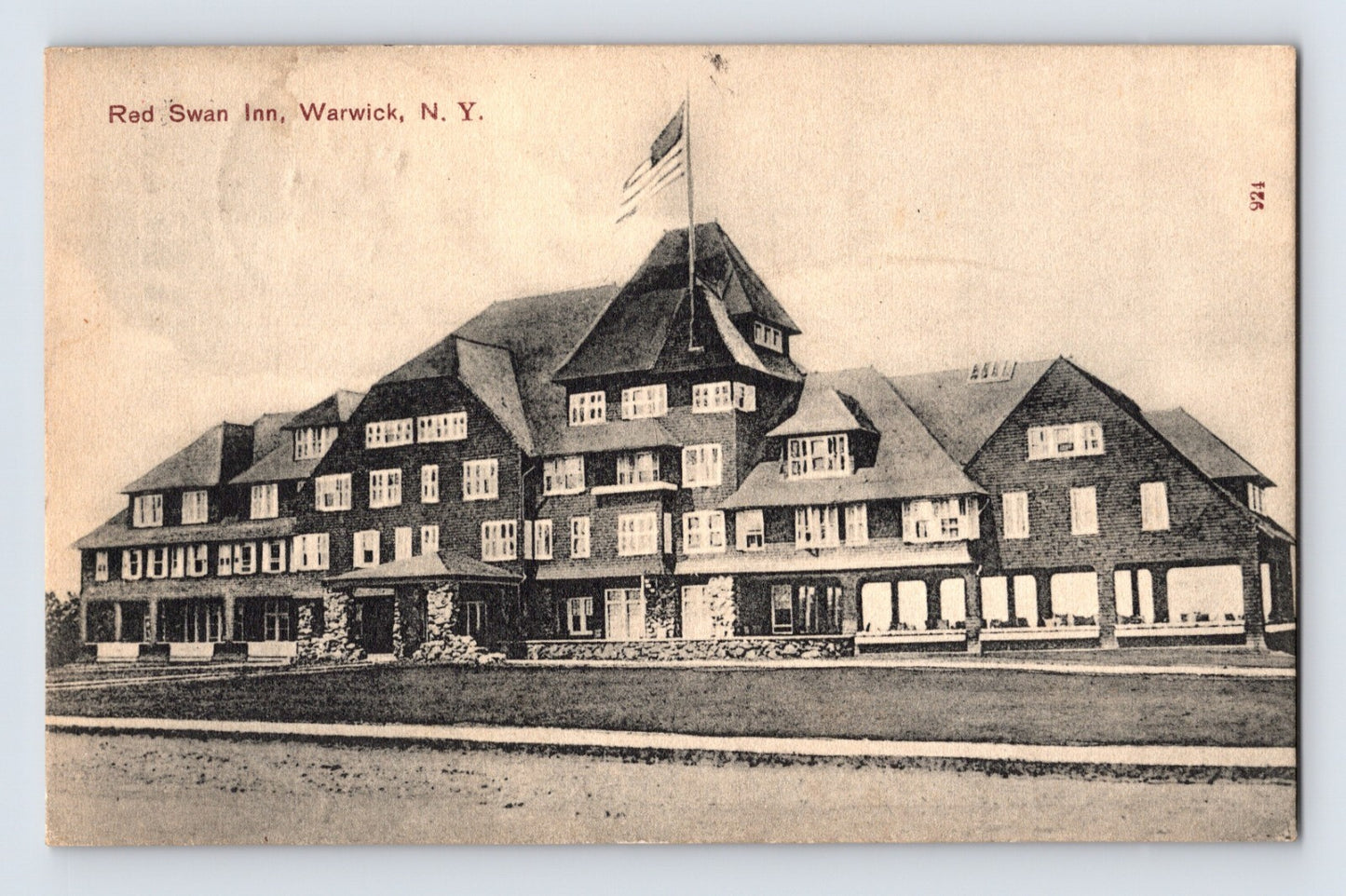 Warwick New York Red Swan Inn hotel exterior 1908 postcard large resort building American flag