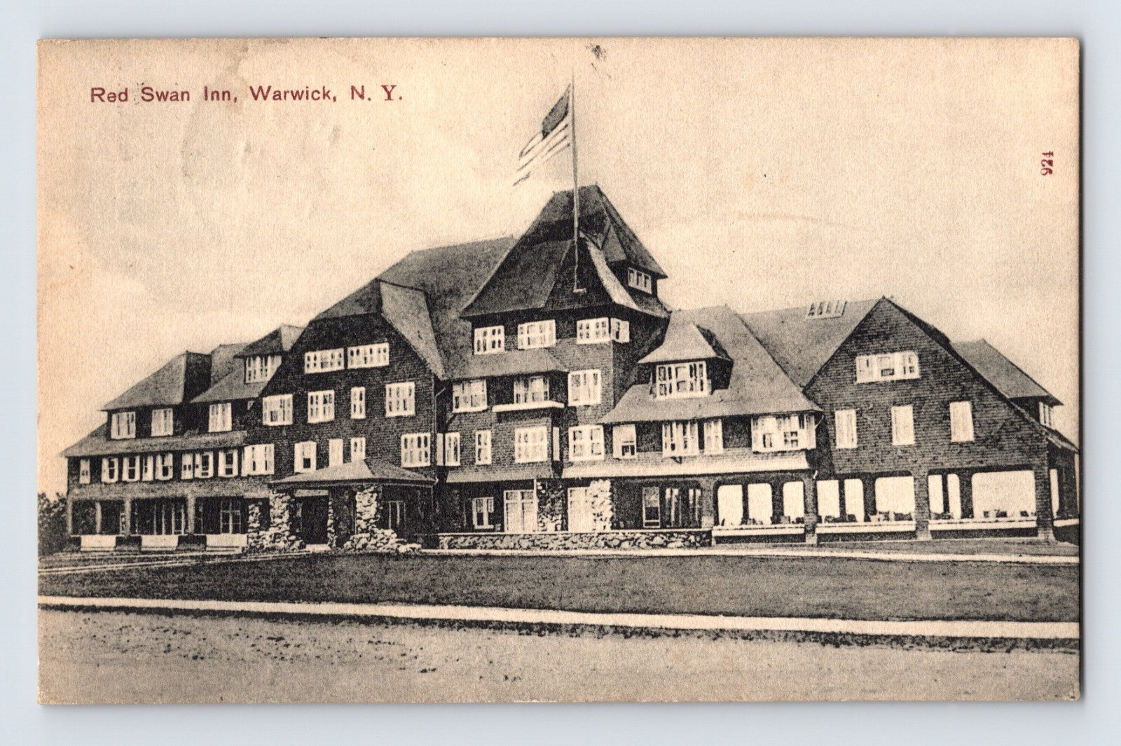 Warwick New York Red Swan Inn hotel exterior 1908 postcard large resort building American flag