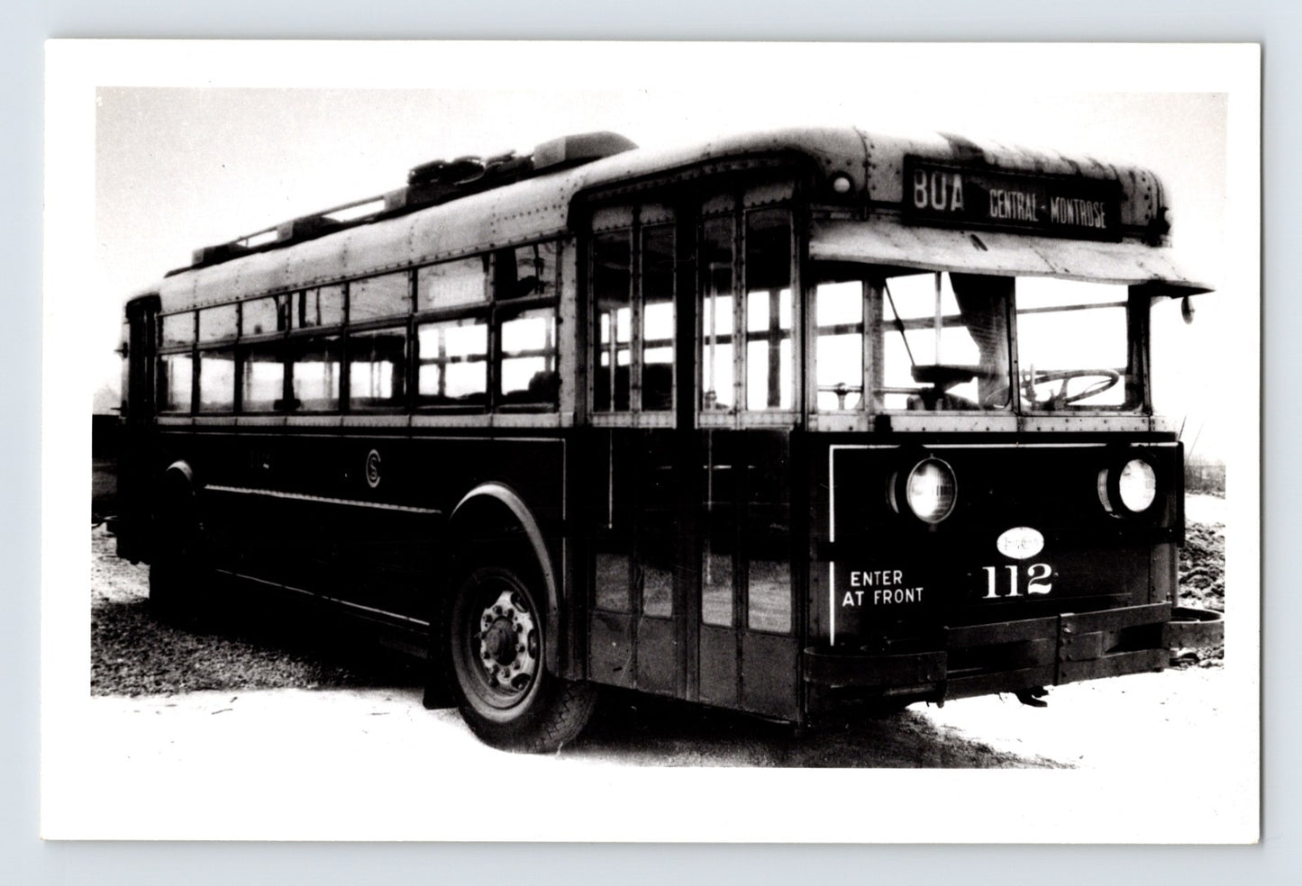 Chicago Surface Lines trolley bus 112 displaying BOA Central Montrose route sign, black and white 1960s urban transit photograph
