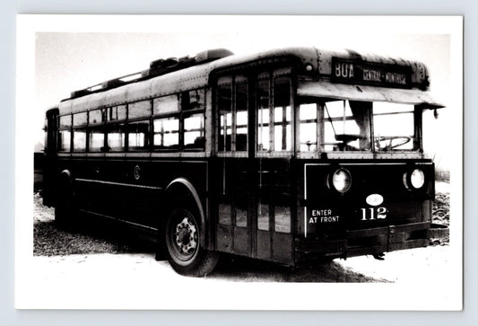 Chicago Surface Lines trolley bus 112 displaying BOA Central Montrose route sign, black and white 1960s urban transit photograph