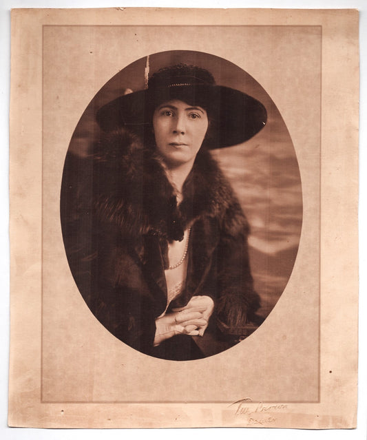 Denver Colorado studio portrait photograph of woman wearing wide hat and fur coat early twentieth century