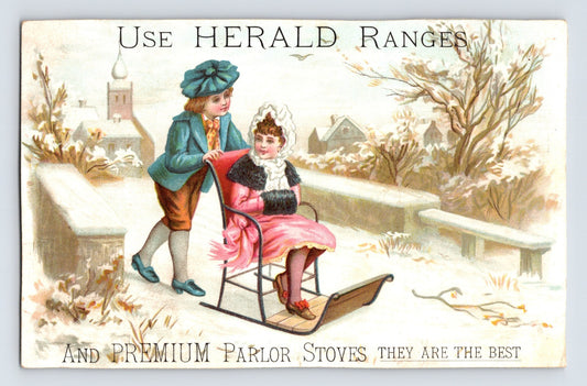 Herald Ranges stove trade card children sled winter scene Millbury Massachusetts H E Newell