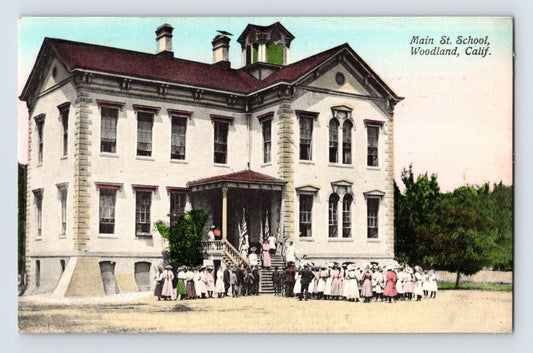 Main Street School Woodland California students gathered outside school building 1910s divided back postcard