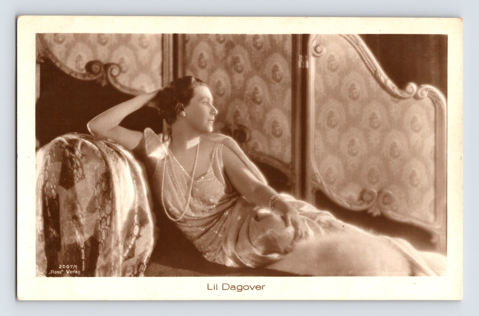Lil Dagover portrait postcard 1930s actress reclining dress pearls studio interior Ross Verlag