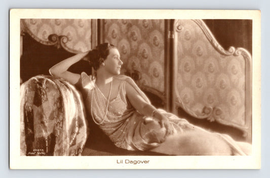 Lil Dagover portrait postcard 1930s actress reclining dress pearls studio interior Ross Verlag