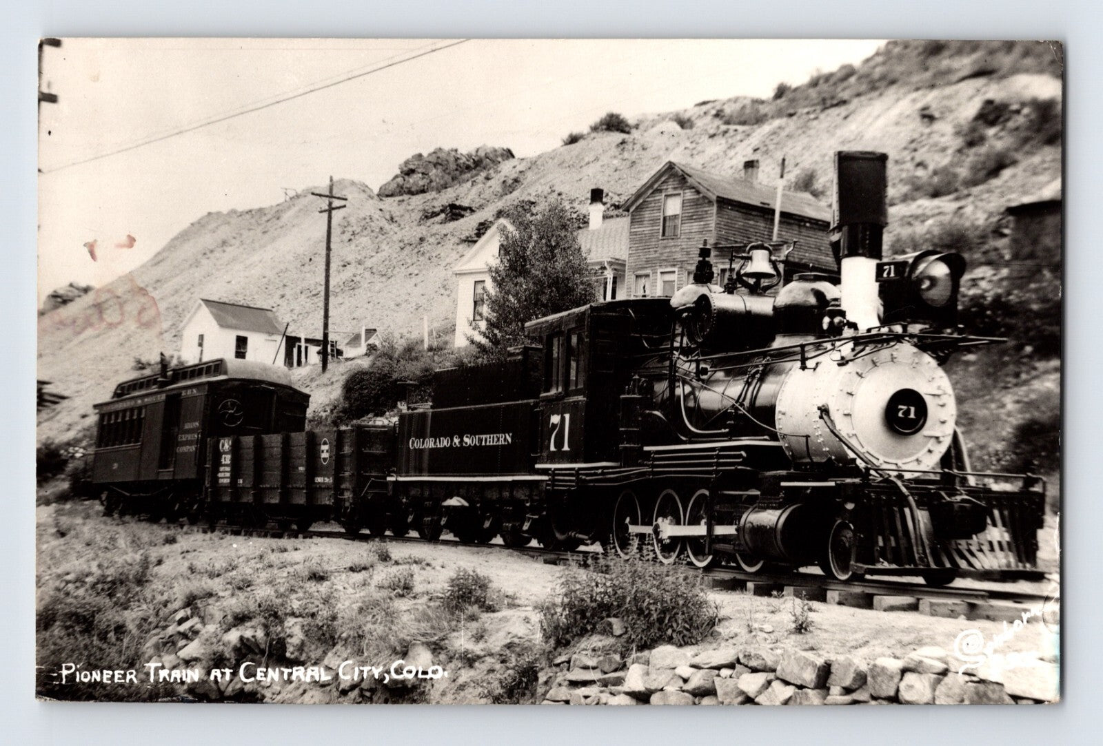 Central City Colorado pioneer train steam locomotive number 71 railroad cars mountain town photo