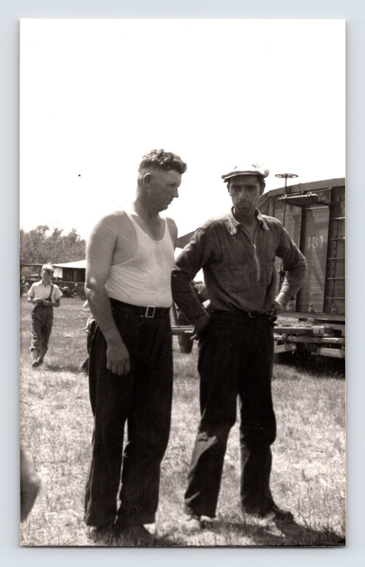 Barnes Sells Floto Circus 1940s circus workers beside wagon on circus grounds photograph