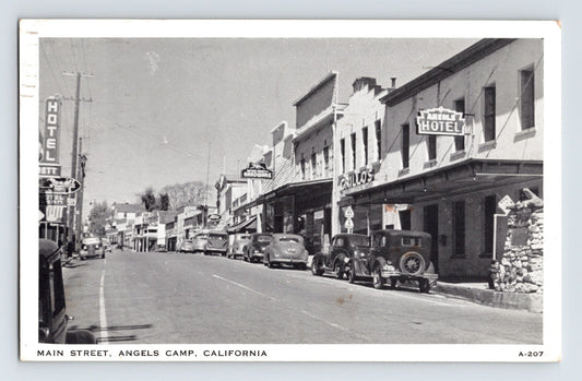 Angels Camp California Main Street downtown storefronts cars 1950s postcard