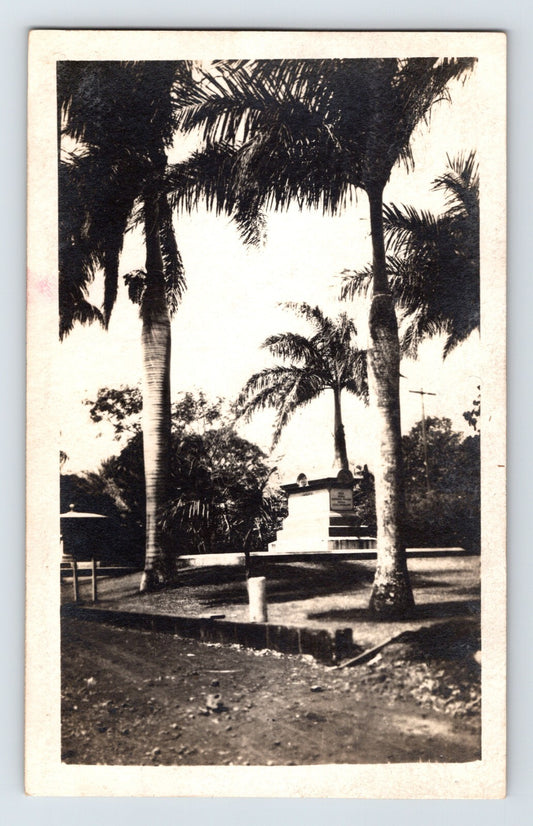 Honolulu Hawaii Royal Mausoleum real photo postcard with palm trees and grounds associated with the Hawaiian royal burial site.
