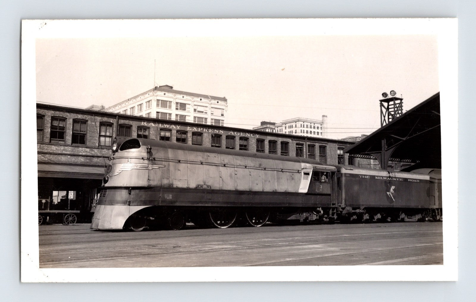 Milwaukee Road 4-4-2 steam locomotive at REA building 1946 railroad photo