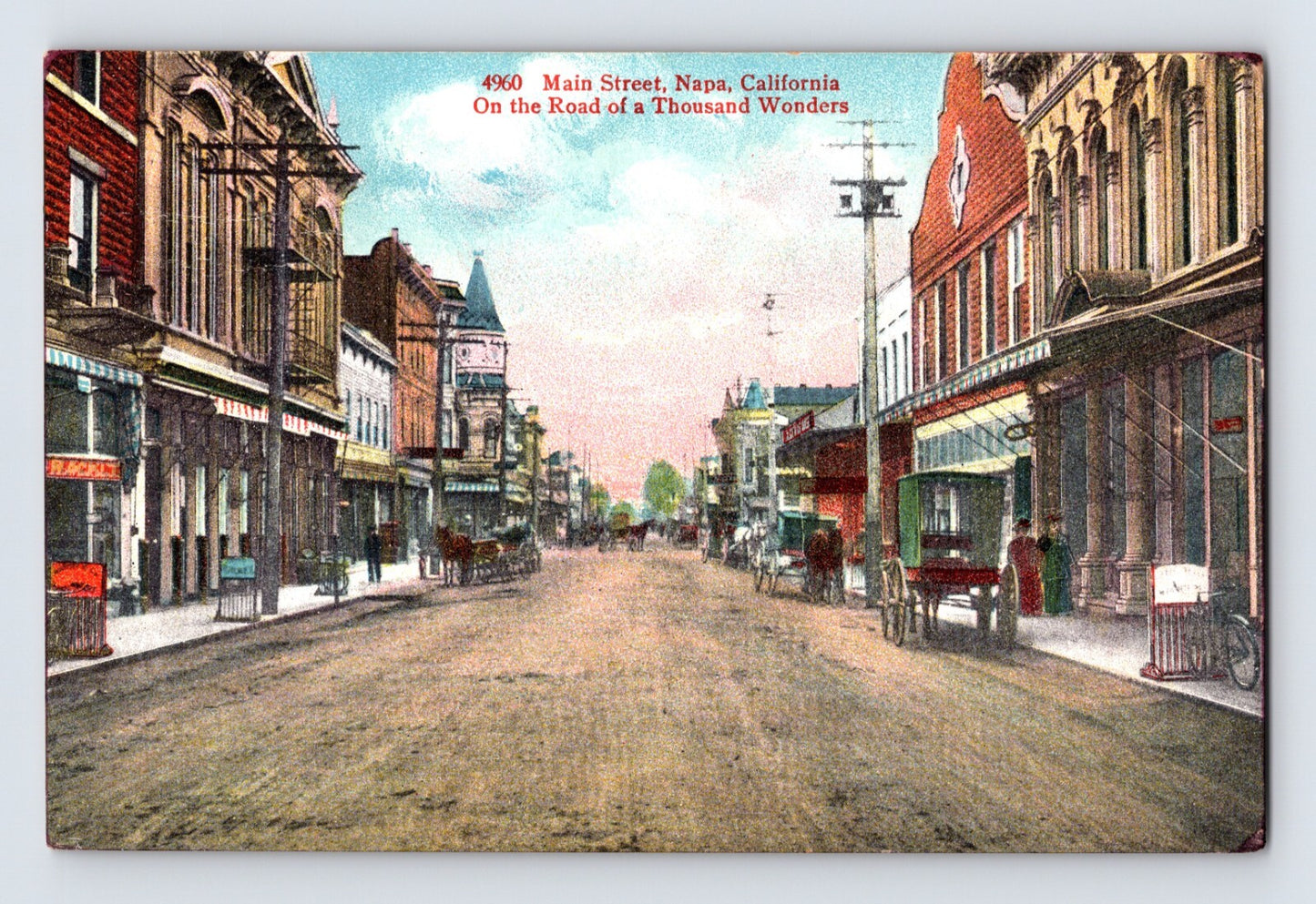 Napa California Main Street 1913 postcard showing downtown storefronts early automobiles horse carriage and unpaved road