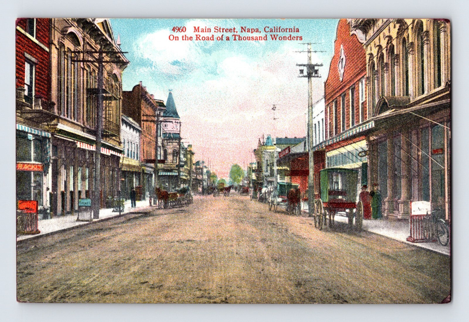 Napa California Main Street 1913 postcard showing downtown storefronts early automobiles horse carriage and unpaved road
