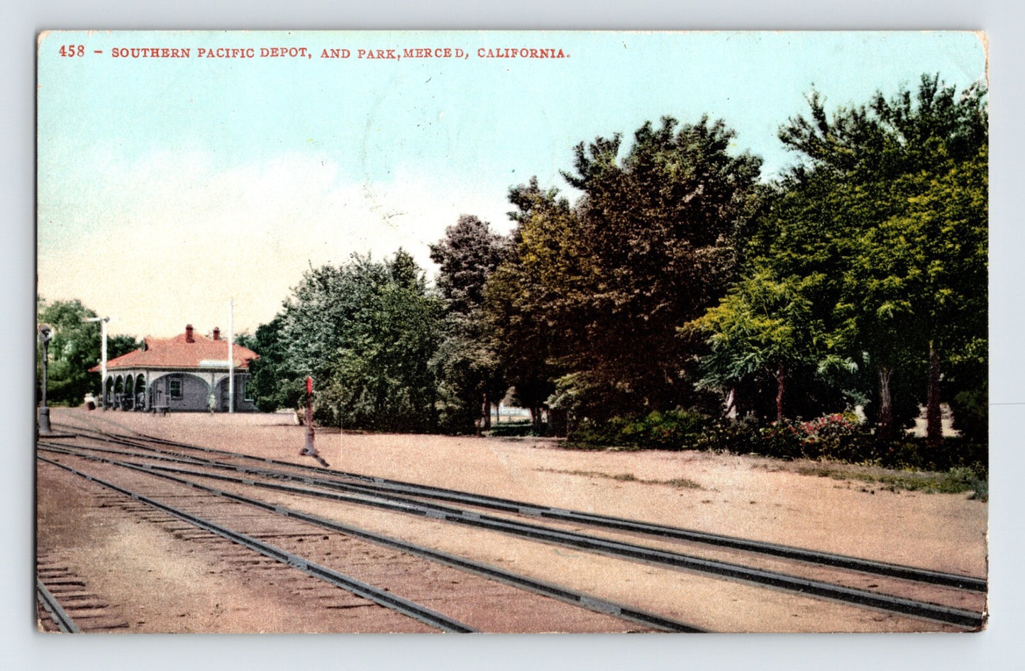 Merced California Southern Pacific depot and park railroad tracks 1907 postcard