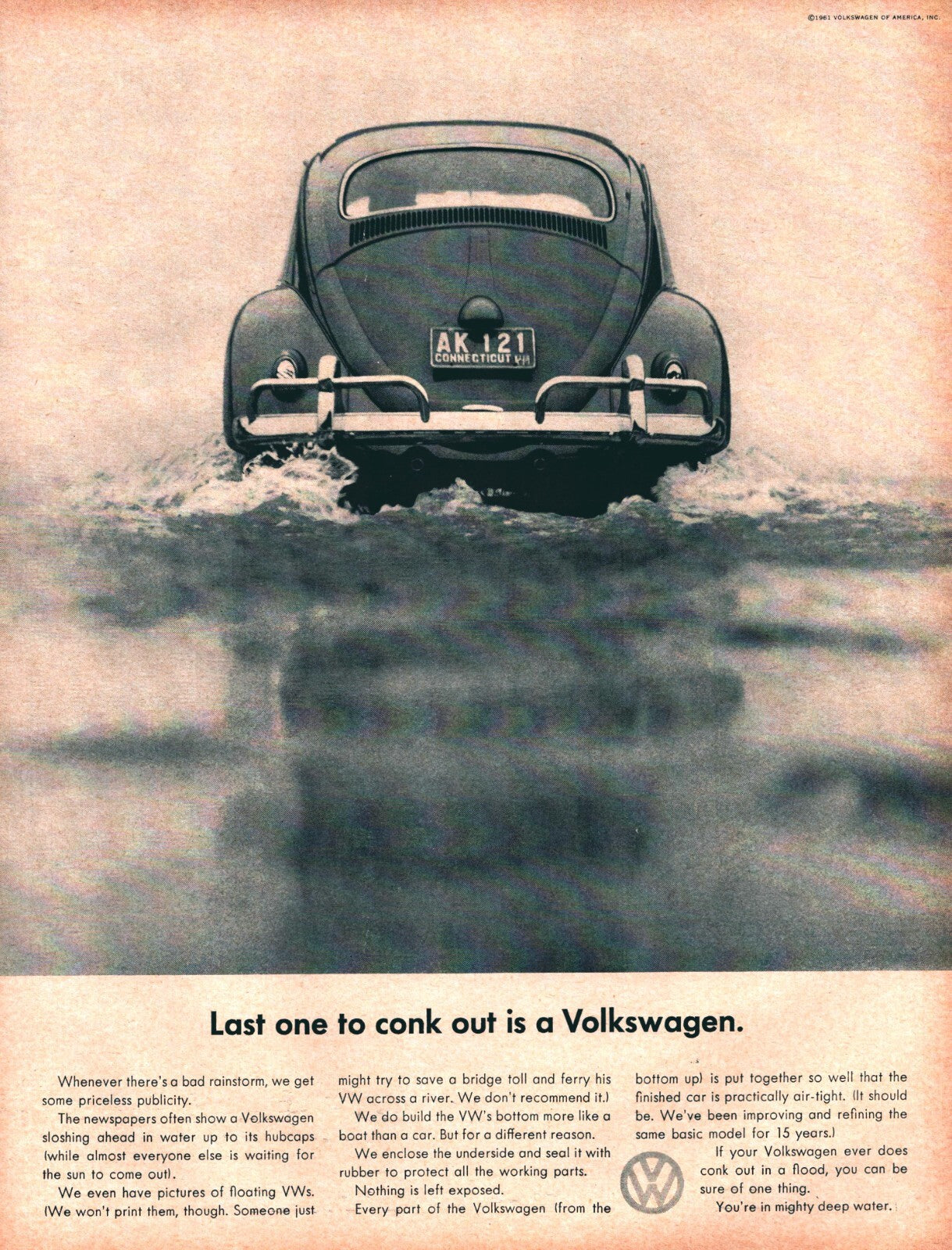 Volkswagen Beetle 1961 print ad showing rear view of car driving through water with slogan last one to conk out is a Volkswagen