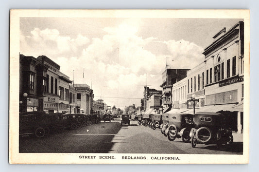 1920s Redlands California downtown street scene automobiles storefronts postcard unposted archival image