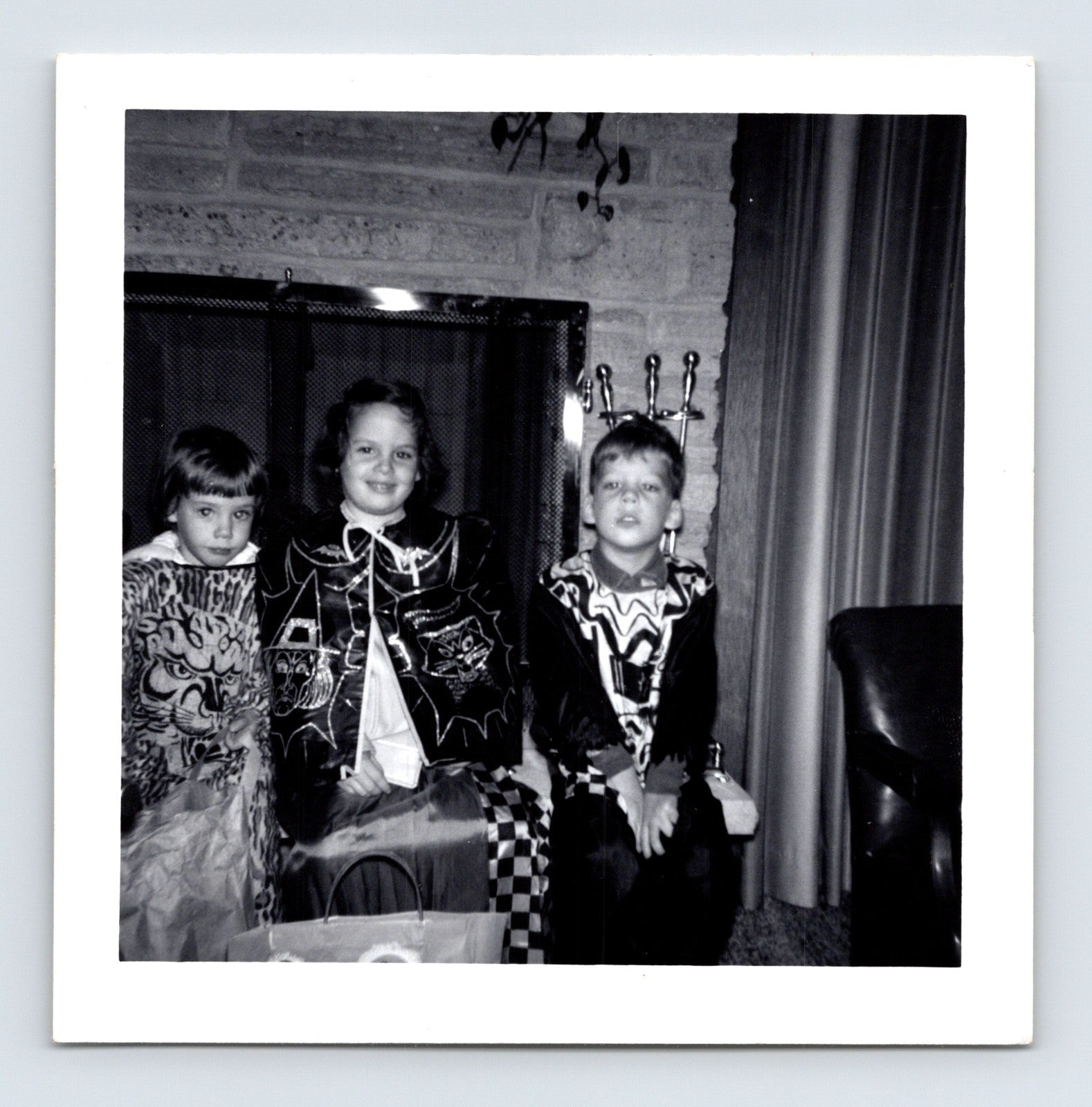 Halloween 1962 children costumes trick or treat masks fireplace candy bag snapshot