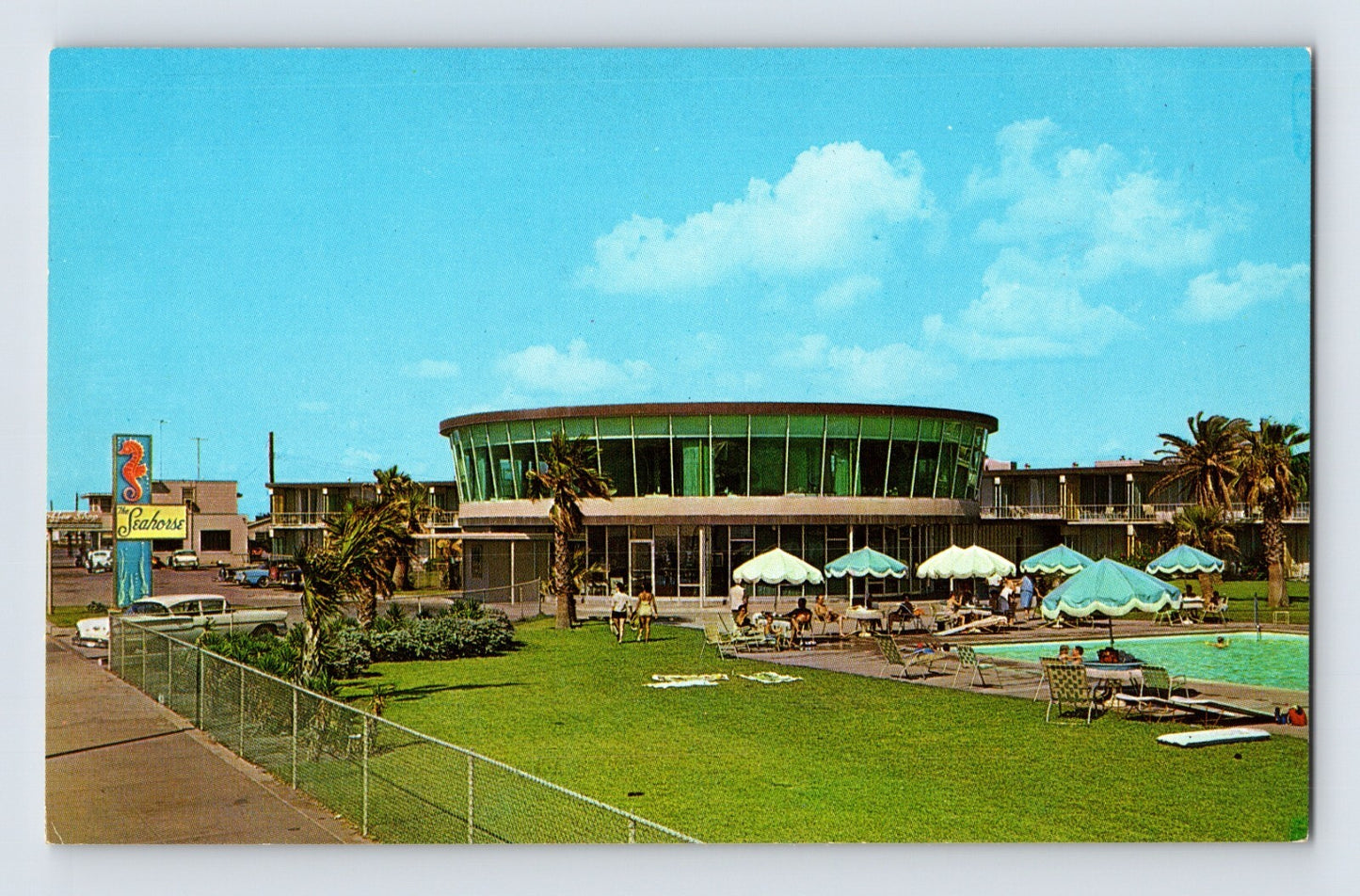 Galveston Texas Seahorse Motel pool mid century modern circular glass building palm trees 1960s chrome postcard