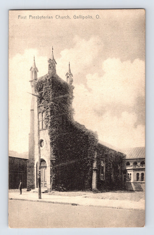 Sepia postcard showing First Presbyterian Church in Gallipolis, Ohio, with ivy-covered façade and twin spires; divided back with 1908 postmark and stamp.