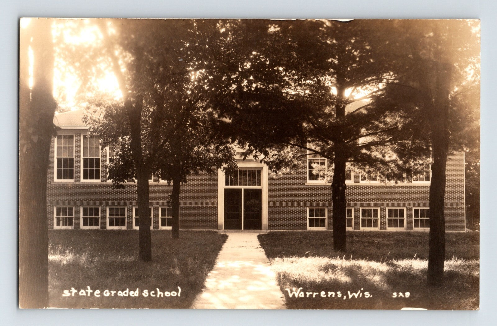 Warrens Wisconsin State Graded School 1930s brick school building trees walkway photo postcard