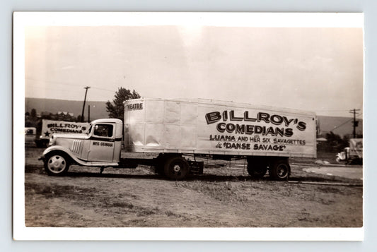 Vintage truck with 'Billroy's Comedians' advertisement on a plain background