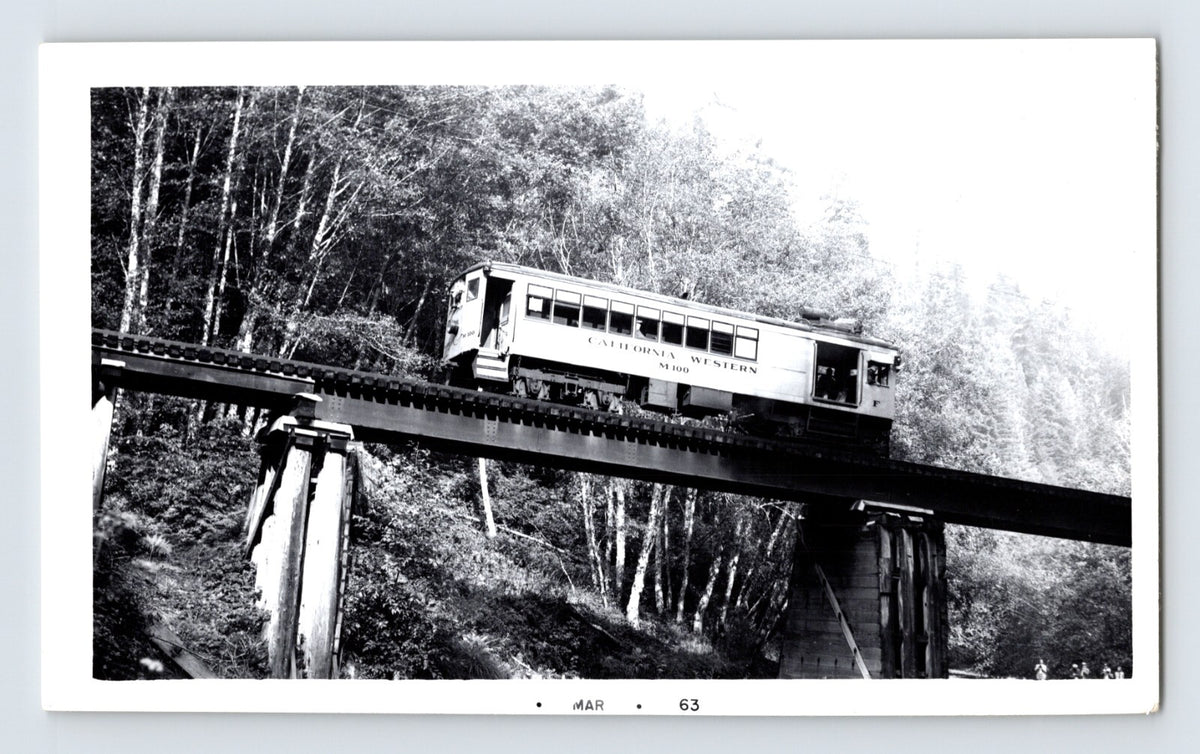 Willits California Western Railroad Skunk Train railcar crossing timber trestle bridge 1951 black and white photograph