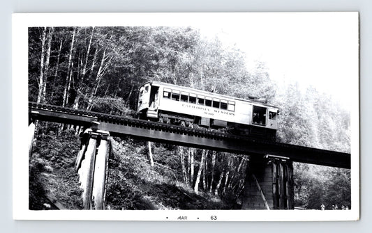 Willits California Western Railroad Skunk Train railcar crossing timber trestle bridge 1951 black and white photograph