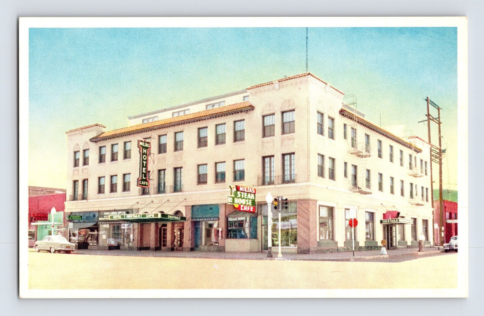 Gilroy California Milias Hotel steak house restaurant corner building 1950s postcard