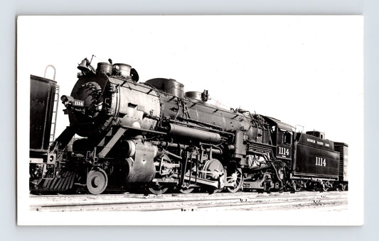 Missouri Pacific Railroad 2-8-2 steam locomotive No. 1114 at San Antonio Texas yard, 1940s black and white railroad photograph